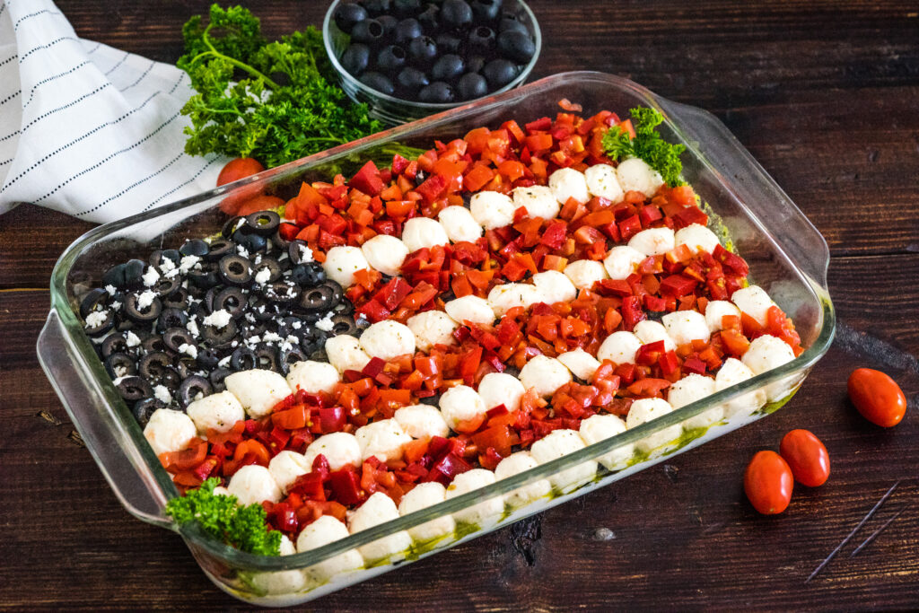 Layered Mediterranean Dip with Olives - California Ripe Olives